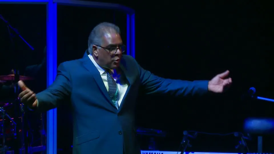 Dr RJ Sing preaching the message